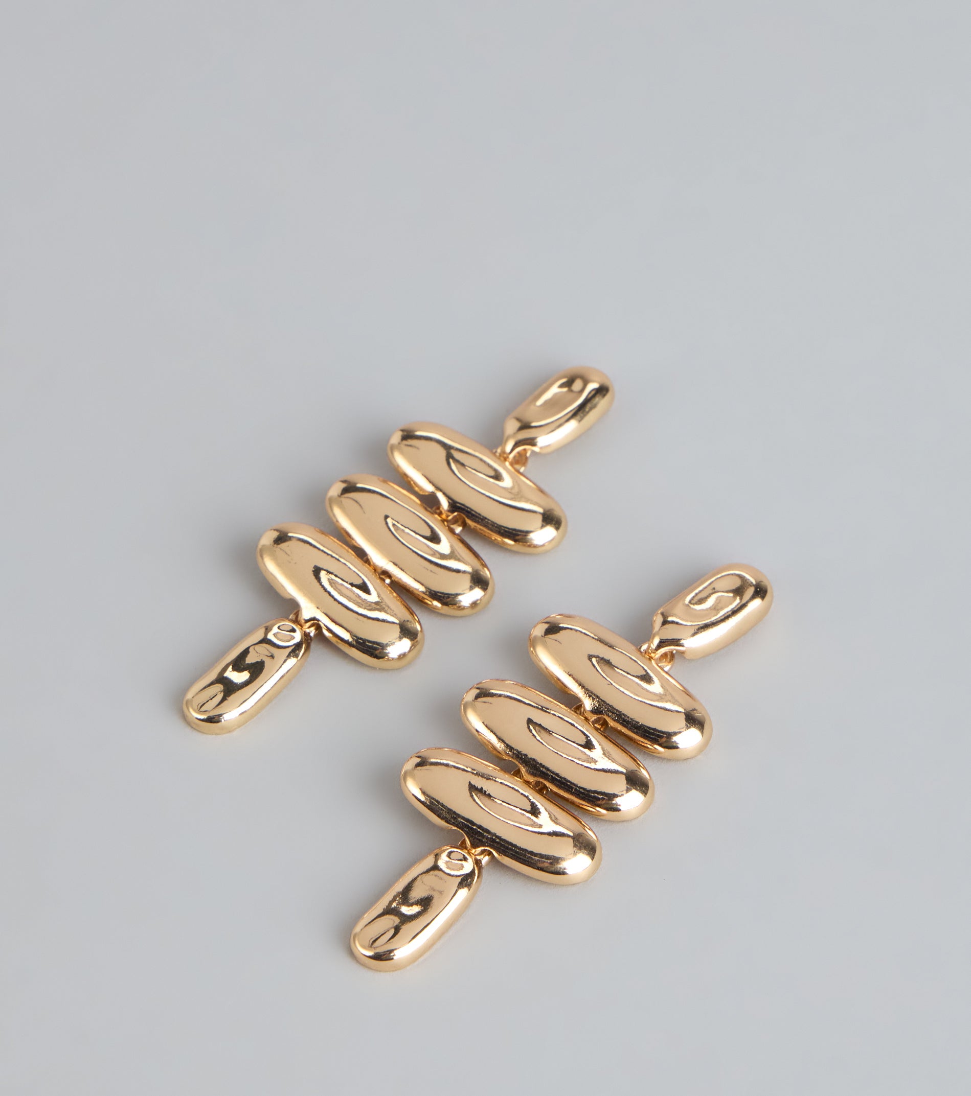 Sculpted Glow Statement Earrings